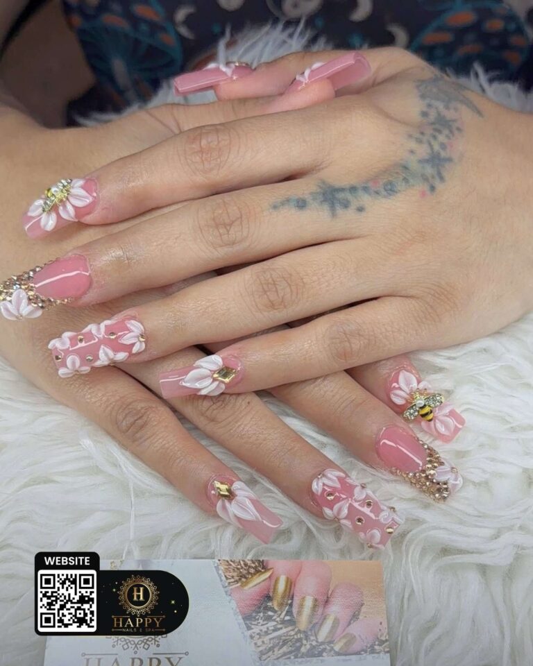 Pink floral nail design from Happy Nails & Spa